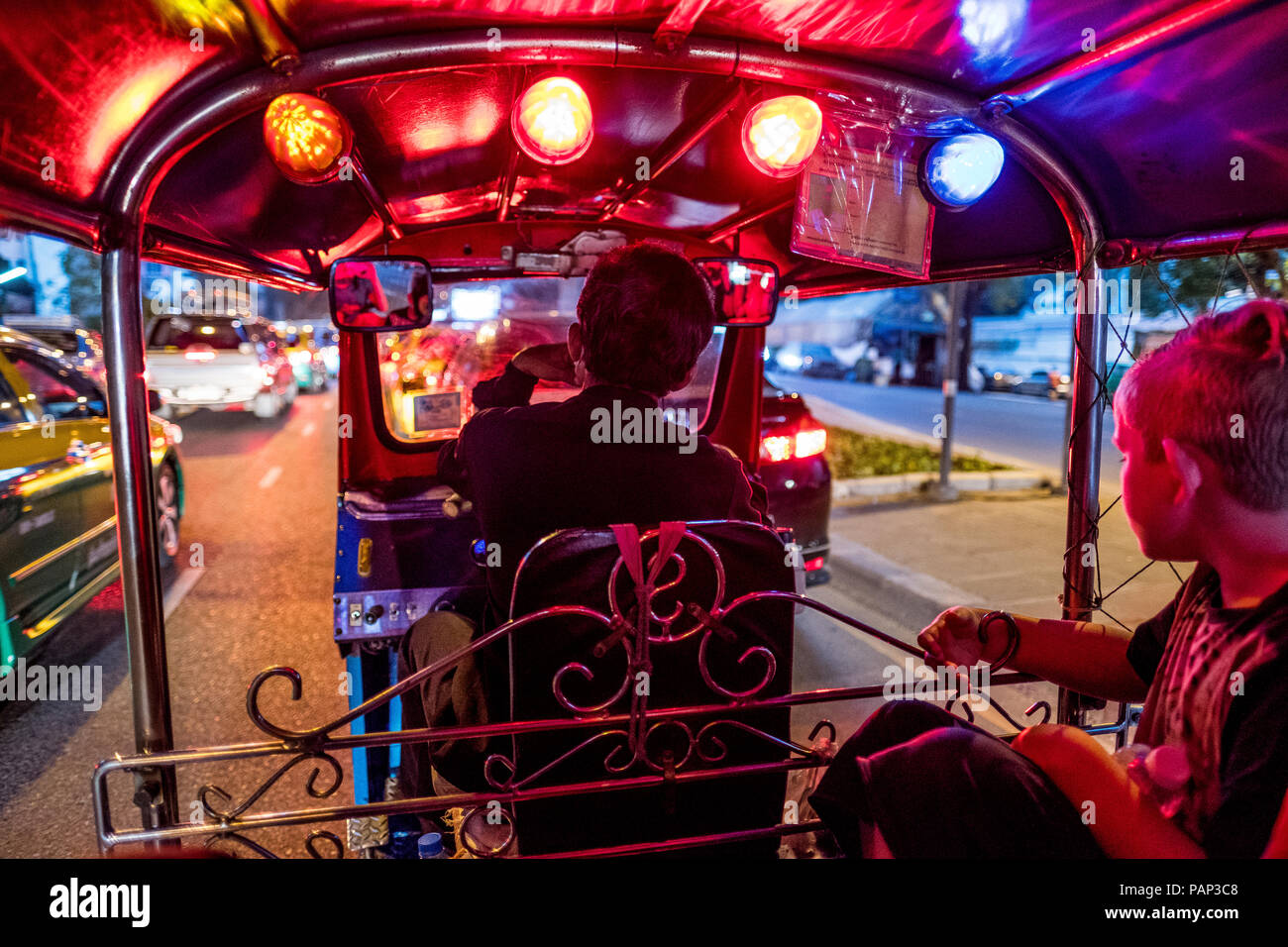 Thailand, Bangkok, boy riding Tuk-Tuk Taxi Stock Photo