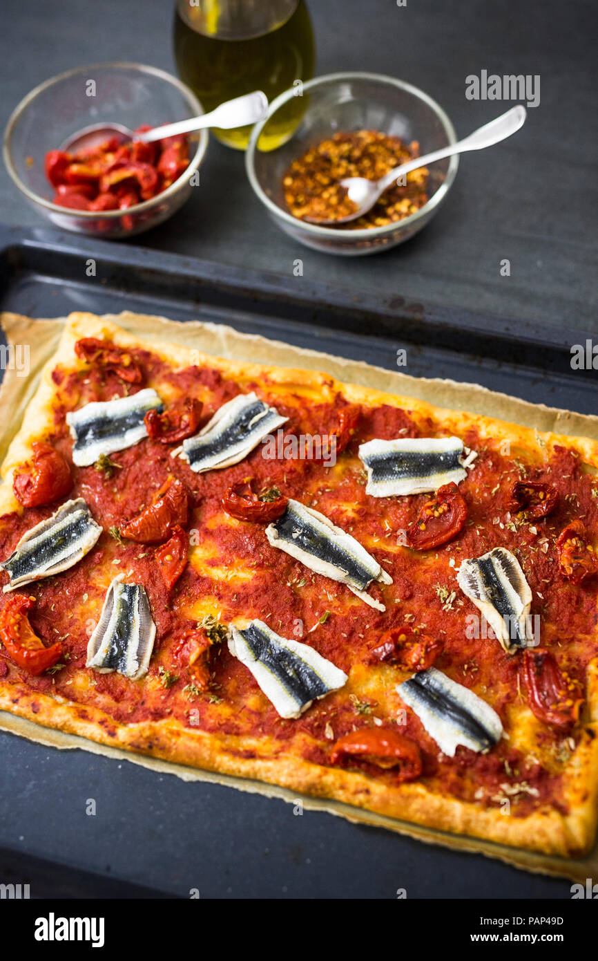 Pizza Marinara with anchovies Stock Photo Alamy