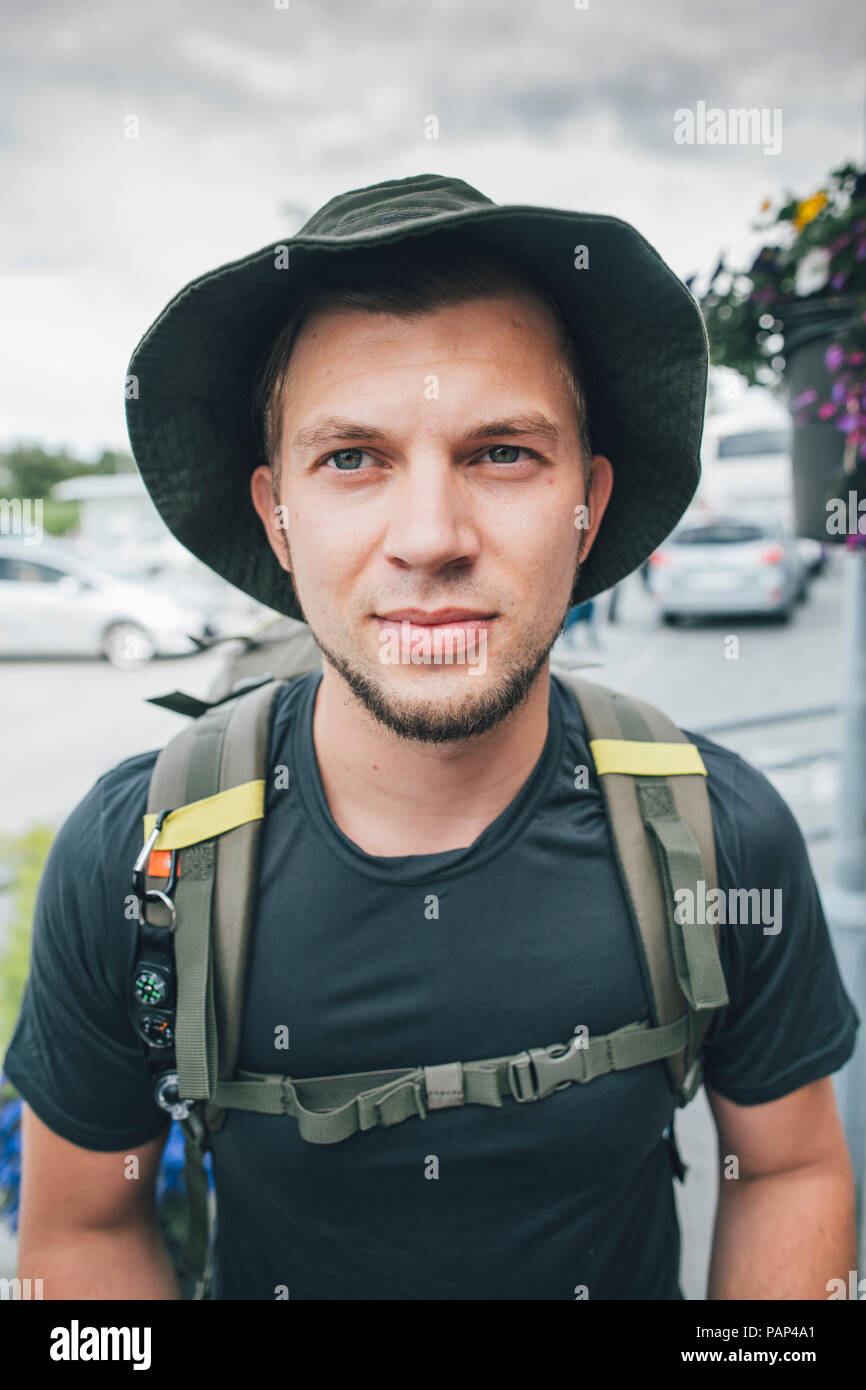 Portrait of backpacker with hat, travelling the Lofoten Stock Photo - Alamy