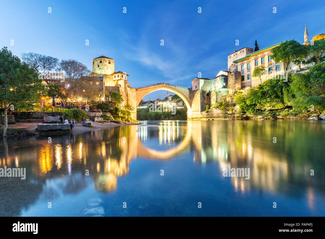 Bosnia and Herzegovina, Mostar, Old town, Old bridge and Neretva river at blue hour Stock Photo