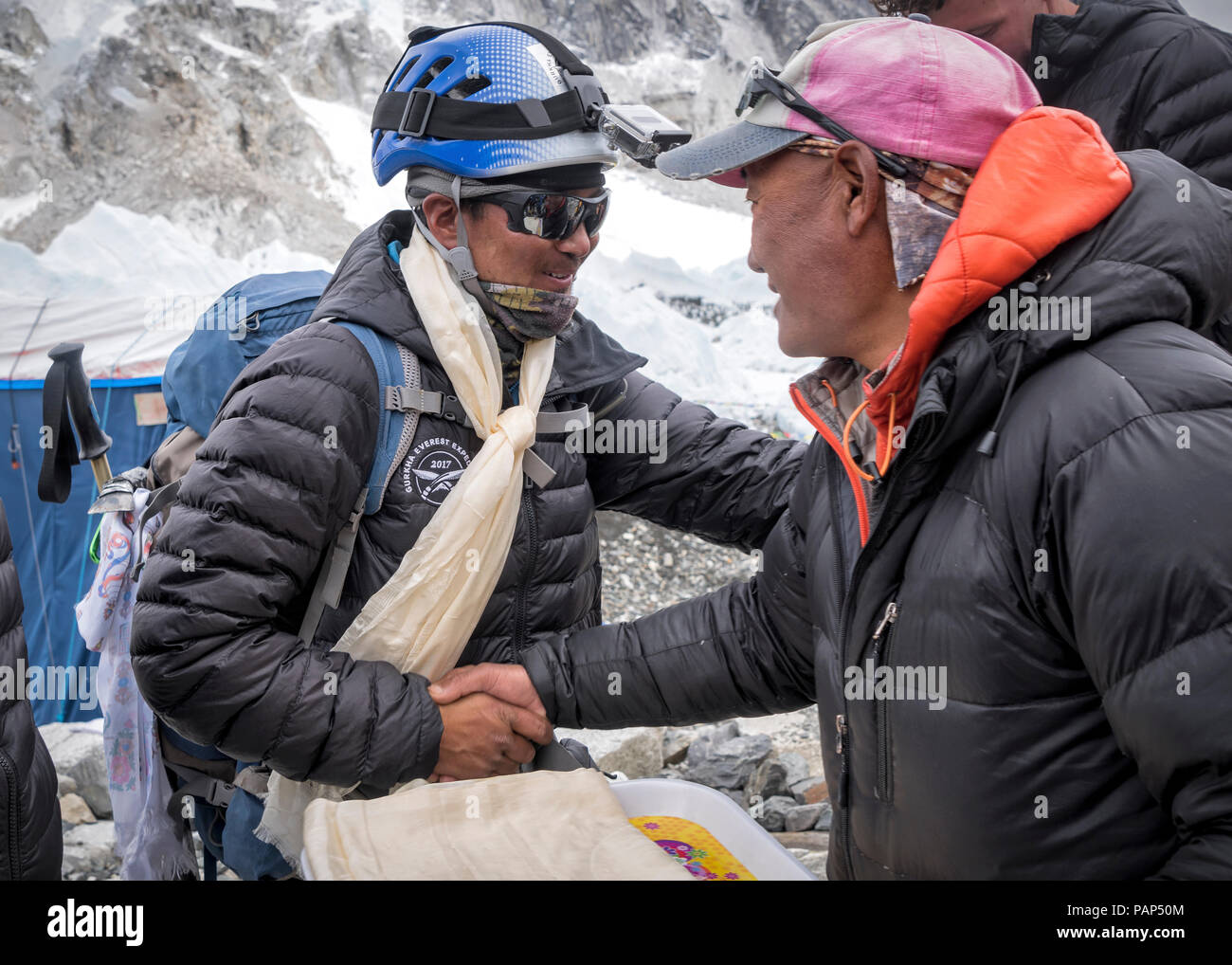 Nepal, Solo Khumbu, Everest, Sagamartha National Park, People greeting at the base camp Stock Photo