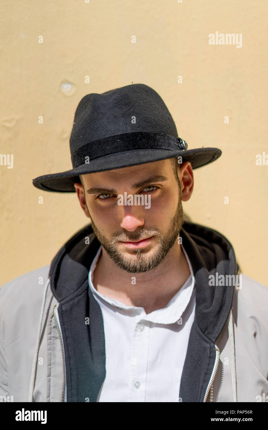 Bearded man wearing black hat hi-res stock photography and images - Alamy