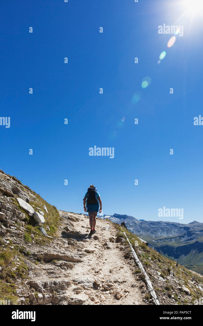Austria, Salzburg State, Region Grossglockner, hiker on trail to Edelweissspitze, High Tauern National Park Stock Photo