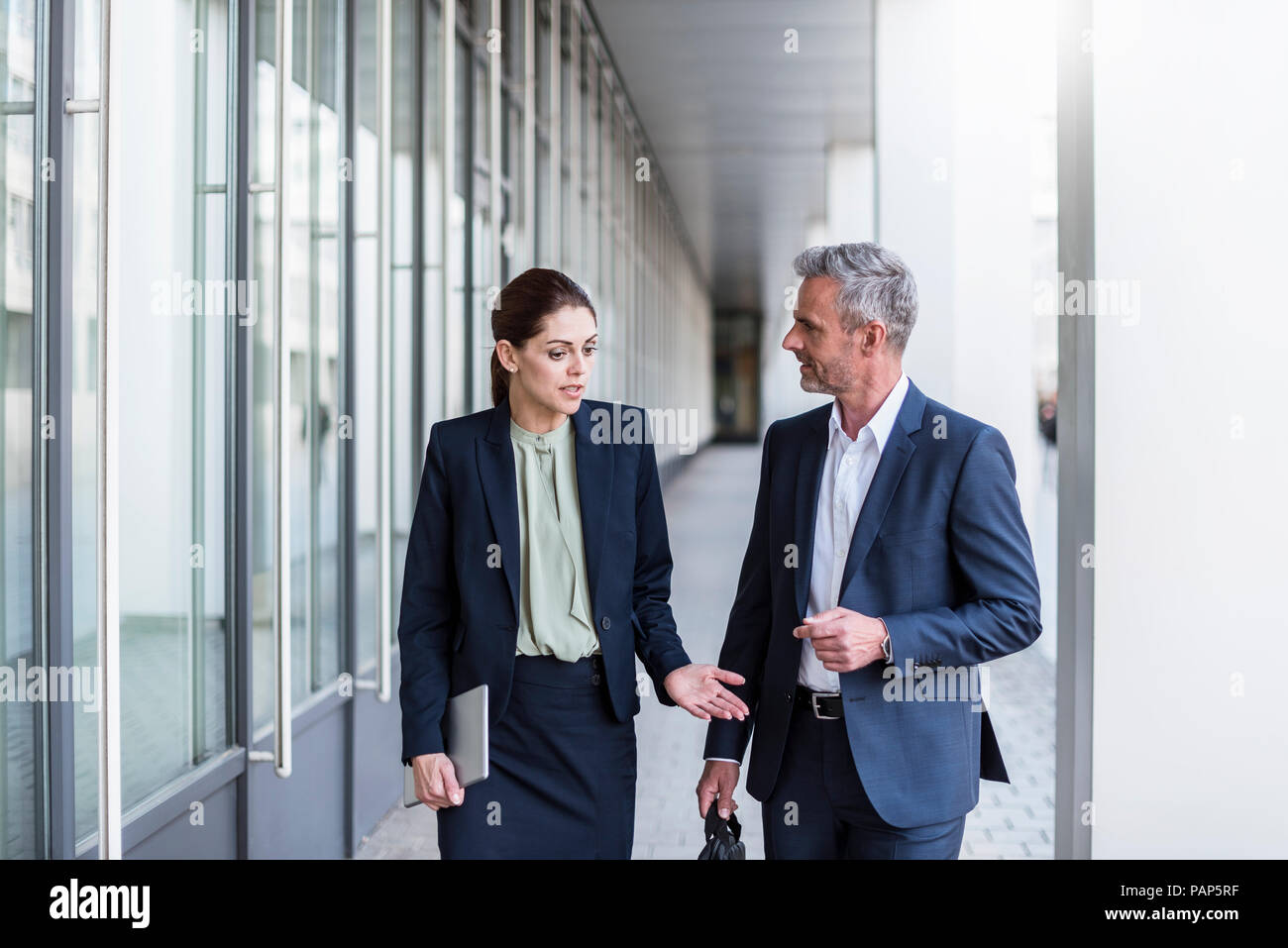 Two discussing business partners Stock Photo