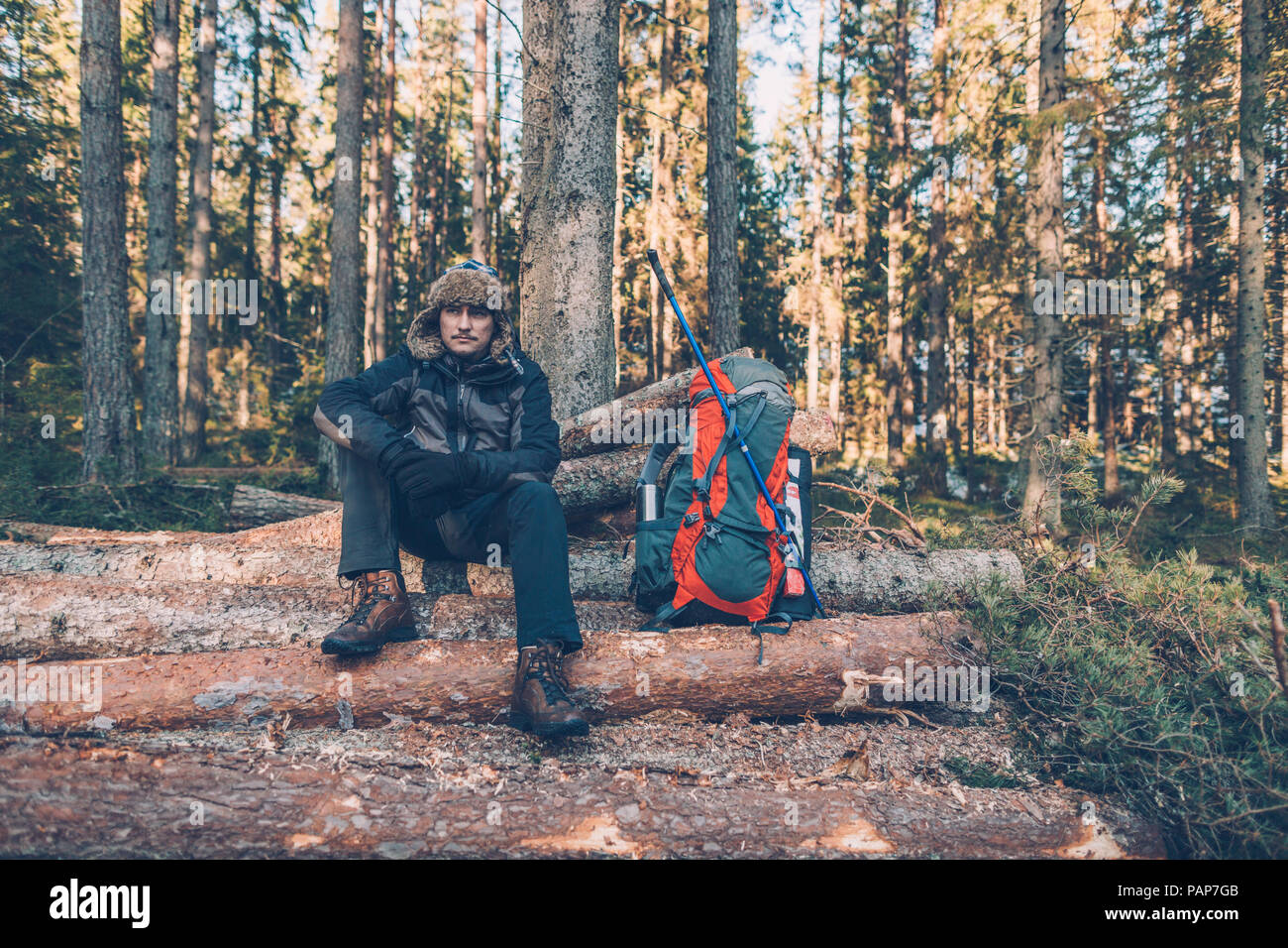 Sweden, Sodermanland, backpacker resting in remote landscape Stock Photo