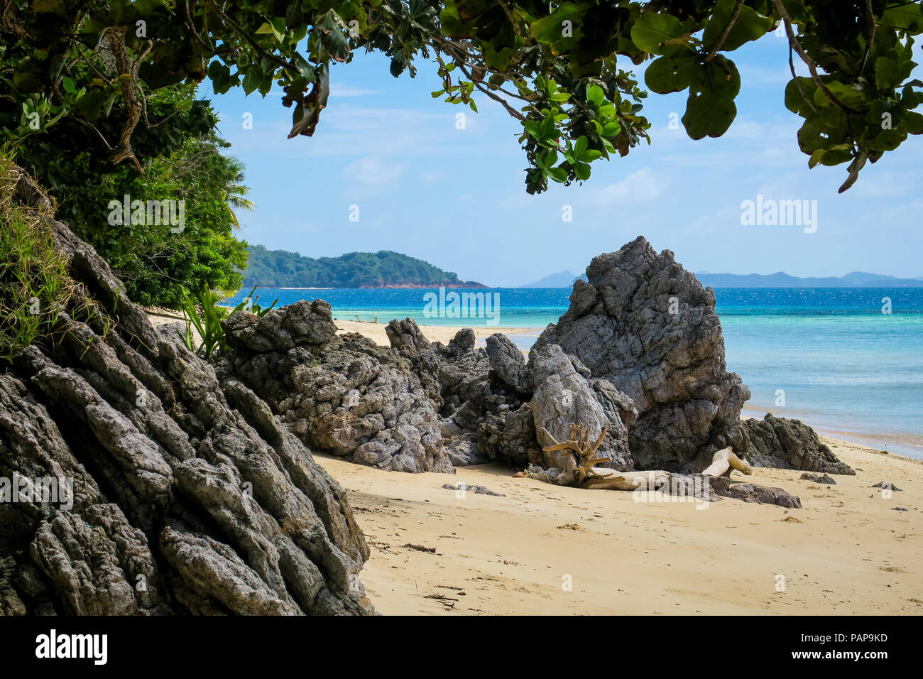 Craggy island beach with turquoise coastline - Linapacan, Palawan - Philippines Stock Photo
