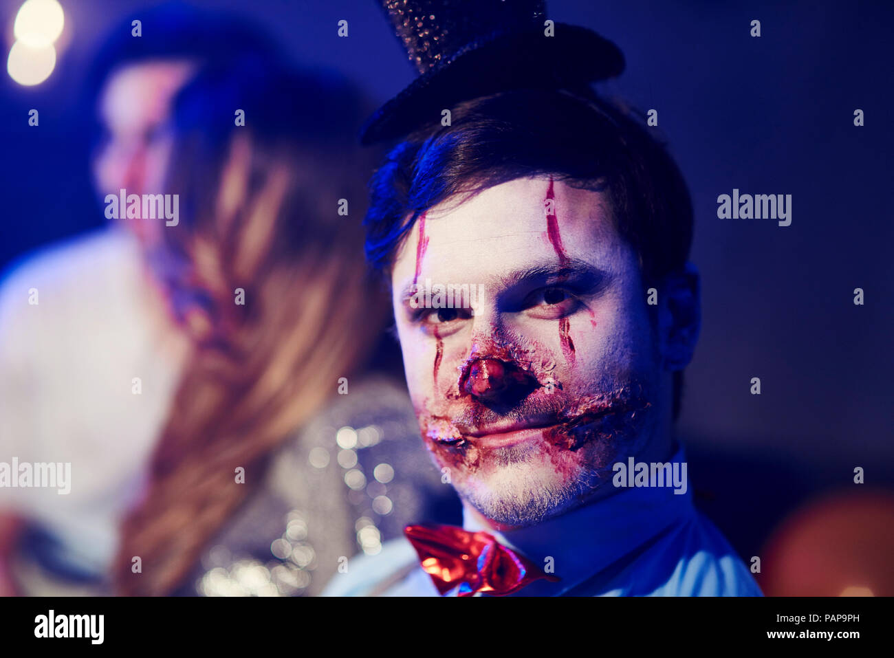Portrait of man in creepy Halloween costume Stock Photo