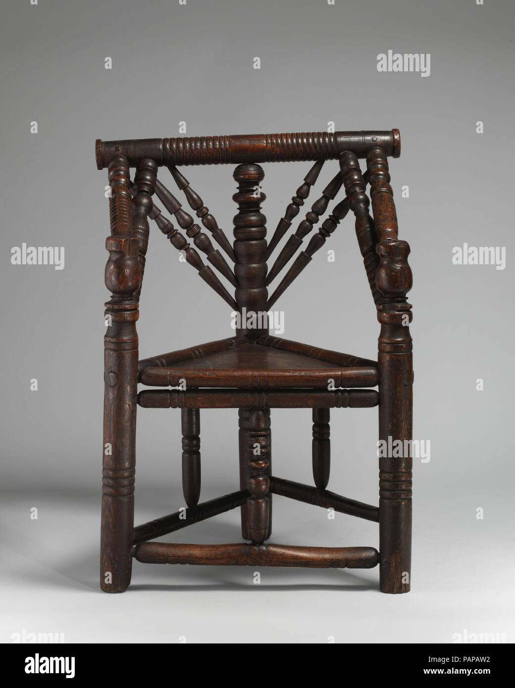 Three-legged chair. Culture: British. Dimensions: Height: 32 1/2 in. (82.6 cm). Date: late 16th-early 17th century. Museum: Metropolitan Museum of Art, New York, USA. Stock Photo