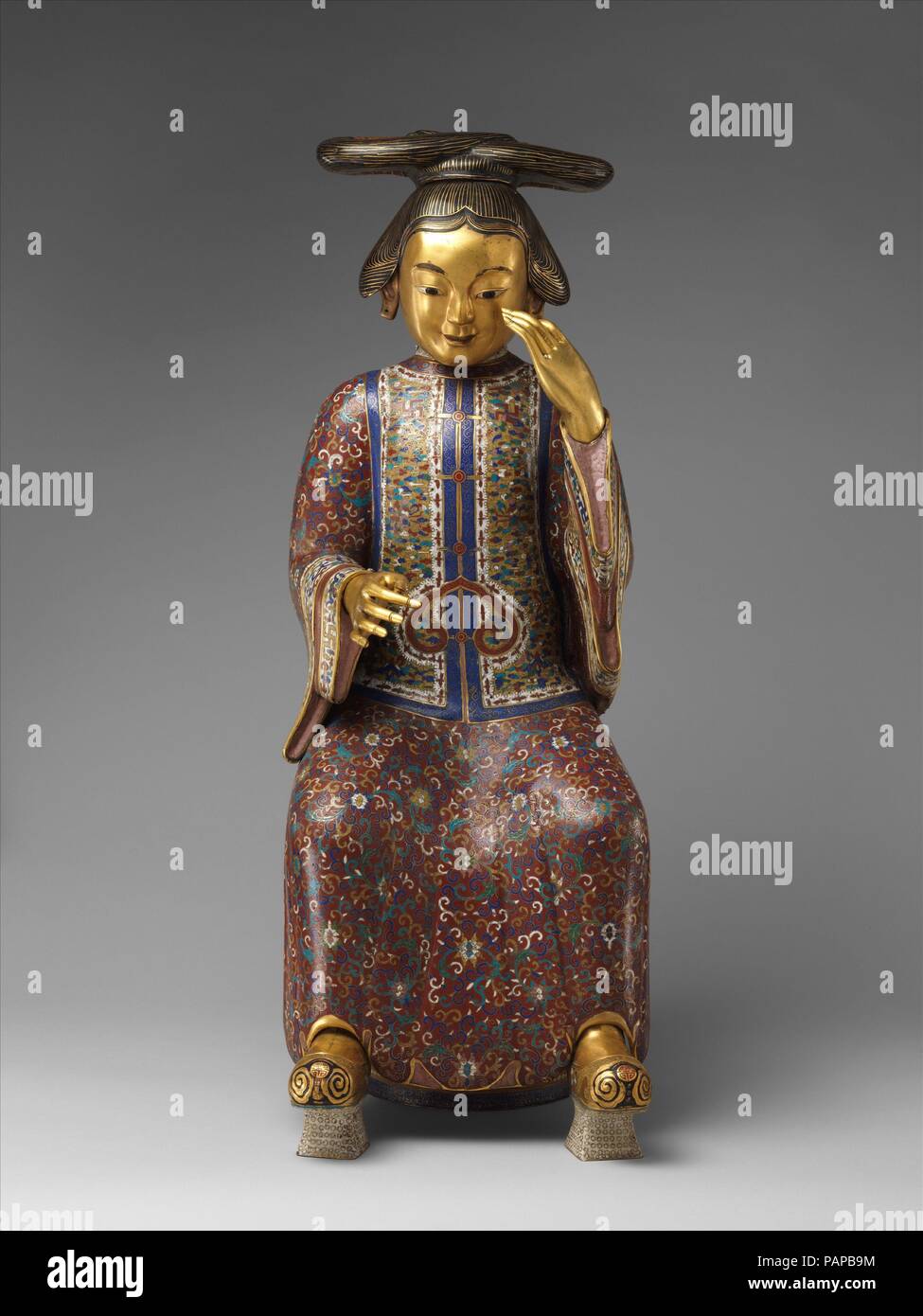 Seated Figure (one of a pair). Culture: China. Dimensions: H. 36 in. (91.4 cm); W. 13 in. (33 cm); D. 17 1/2 in. (44.5 cm). Museum: Metropolitan Museum of Art, New York, USA. Stock Photo