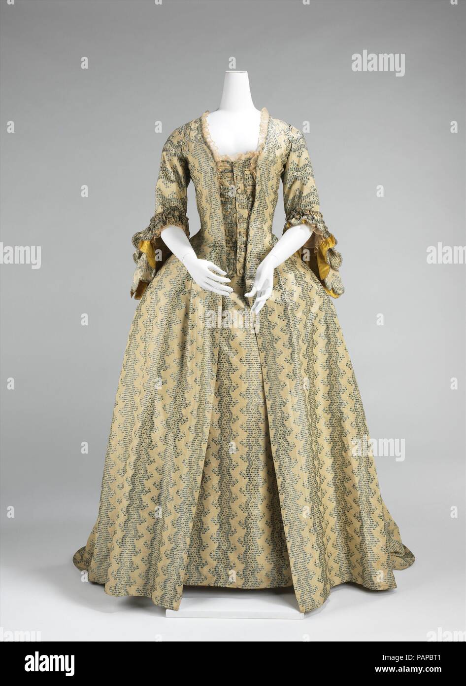 Robe à la Française. Culture: French. Date: 1760-70. Women with coquettish  airs were imposing in robes à la française and robes à l'anglaise  throughout the period between 1720 and 1780. The robe