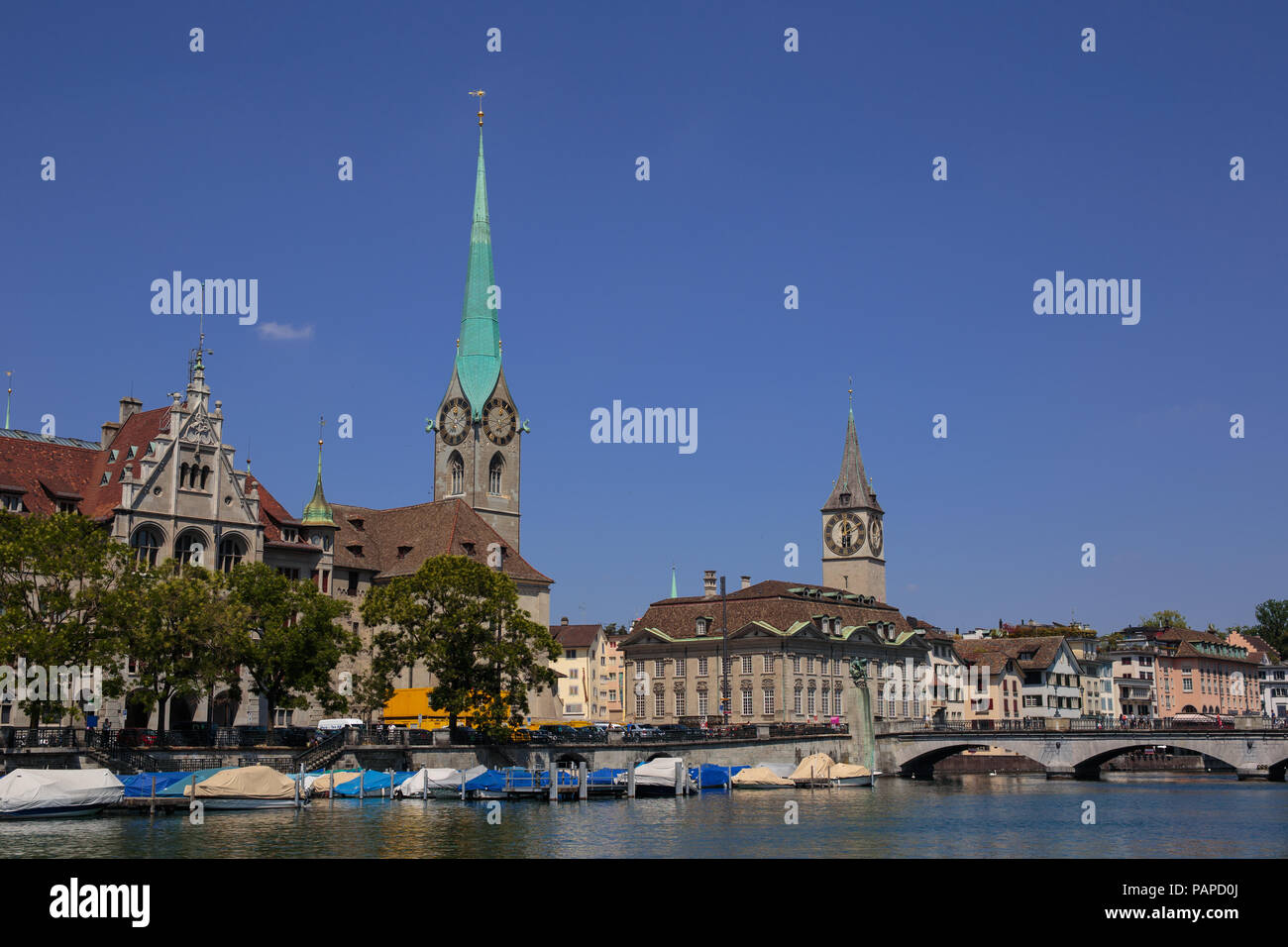 Famous view of various houses and churches in the old town part of Zurich. Zurich is the biggest city in Switzerland. Stock Photo