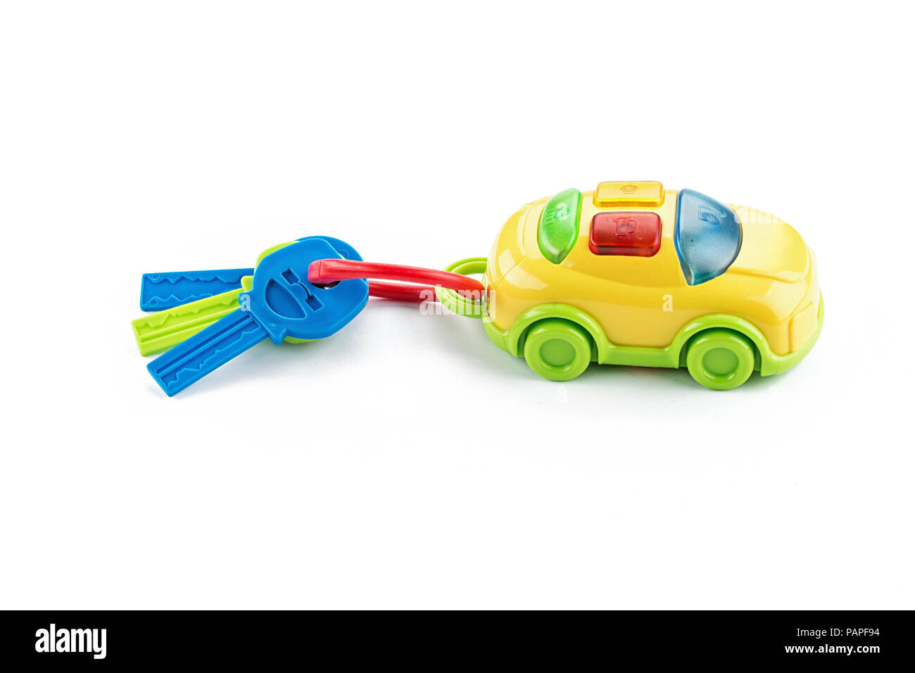 toy car and keys, isolated, on white background, place for text Stock