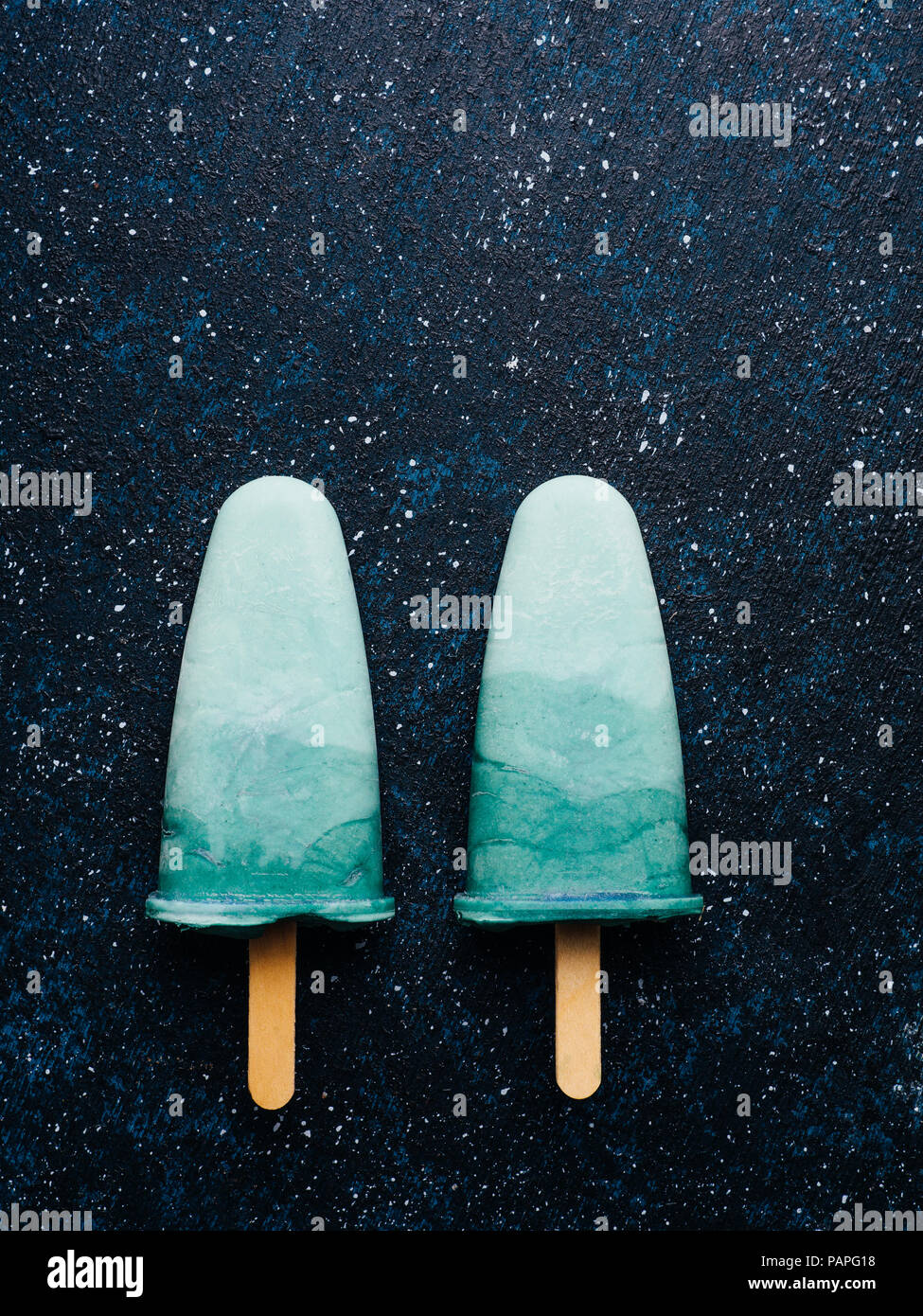 Superfood spirulina popsicles on dark background.Ideas and recipes for