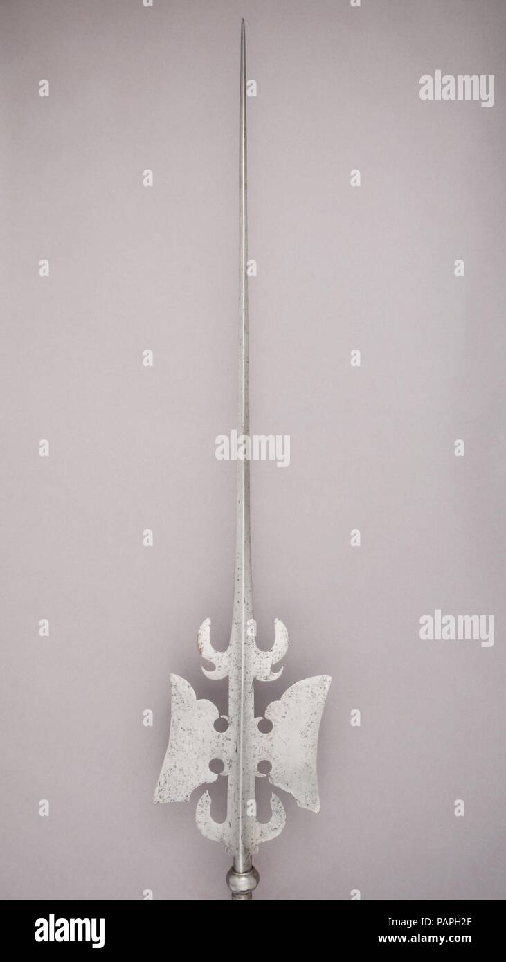 Halberd. Culture: possibly Italian. Dimensions: L. 9 ft. 6 in. (290.2 cm); L. of head 44 3/4 in. (113.6 cm); W. 7 5/8 in. (19.4 cm); Wt. 7 lbs. 14 oz. (3570 g). Date: ca. 1550. Museum: Metropolitan Museum of Art, New York, USA. Stock Photo