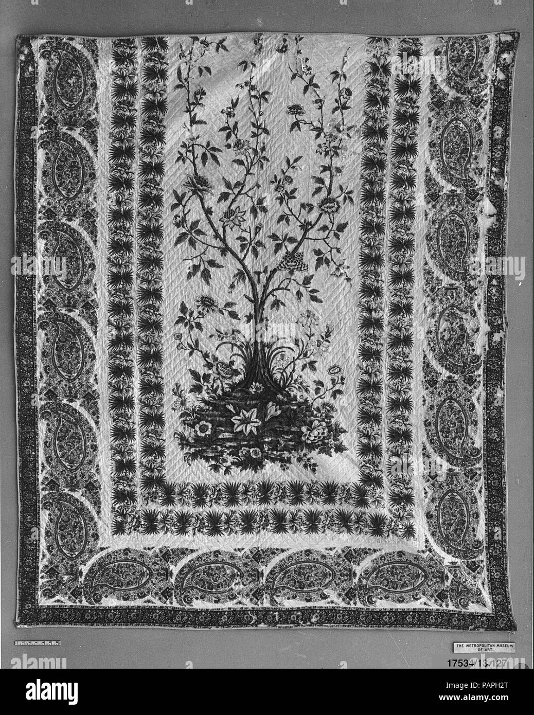 Quilt. Culture: British, Preston. Dimensions: L. 87 x W. 73 inches  221.0 x 185.4 cm. Manufactory: Bannister Hall (British, founded ca. 1798). Date: ca. 1810-15.  The Bannister Hall print works was founded ca. 1798 by Richard Jackson and John Stephenson. Between 1809 and 1825 it was owned by Charles Swainson with varying partners. It was the leading firm for woodblock 'furniture' chintzes. Museum: Metropolitan Museum of Art, New York, USA. Stock Photo