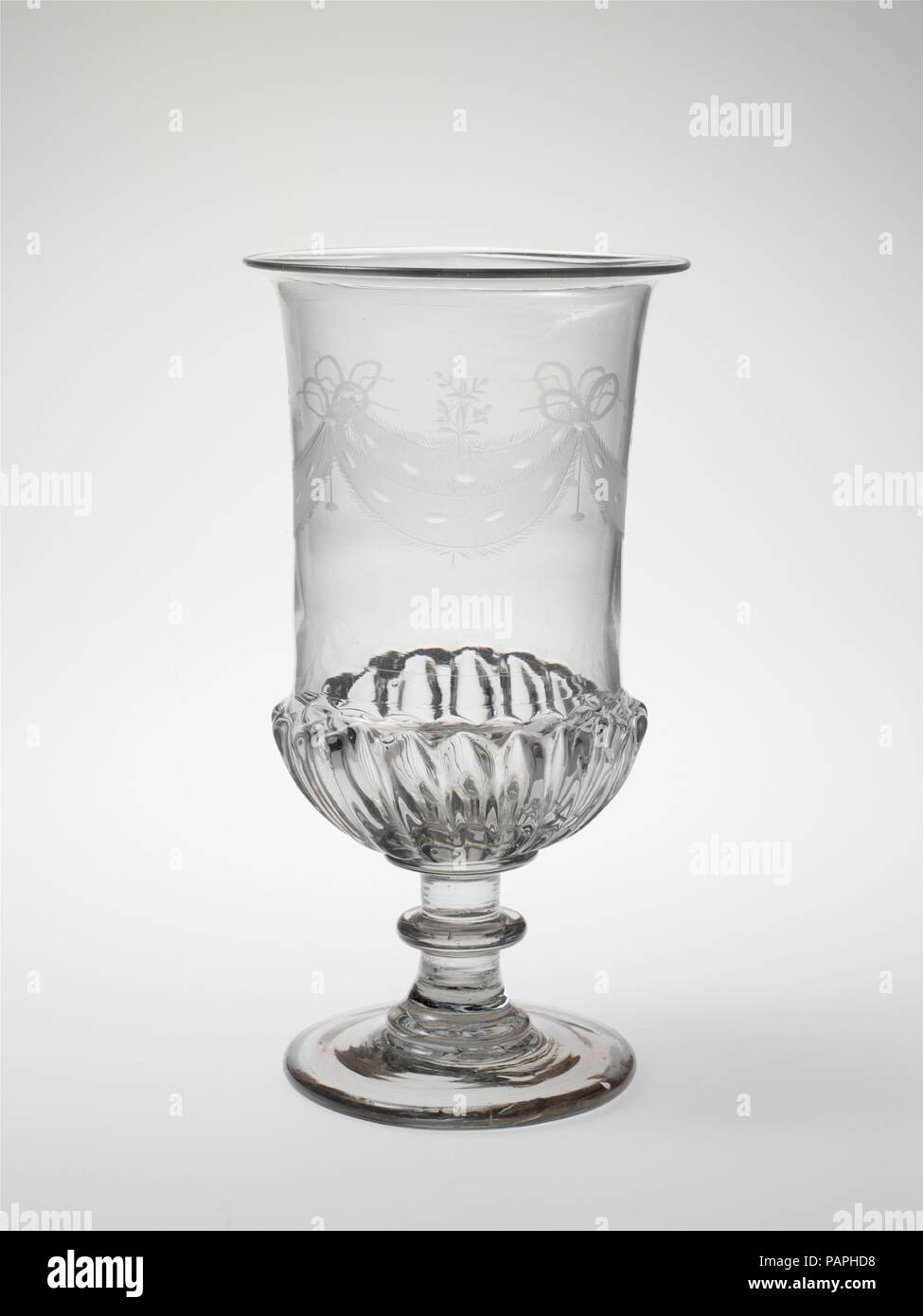 Celery vase. Culture: American. Dimensions: H. 9 in. (22.9 cm); Diam. 3 7/8 in. (9.8 cm). Maker: Bakewell, Page & Bakewell (1808-1882); Possibly Benjamin Bakewell & Co. (1809-1813) or. Date: 1810-20.  The molded fluting around the base of the vase may reference gadrooning on silver vessels of the seventeenth and eighteenth centuries. Museum: Metropolitan Museum of Art, New York, USA. Stock Photo