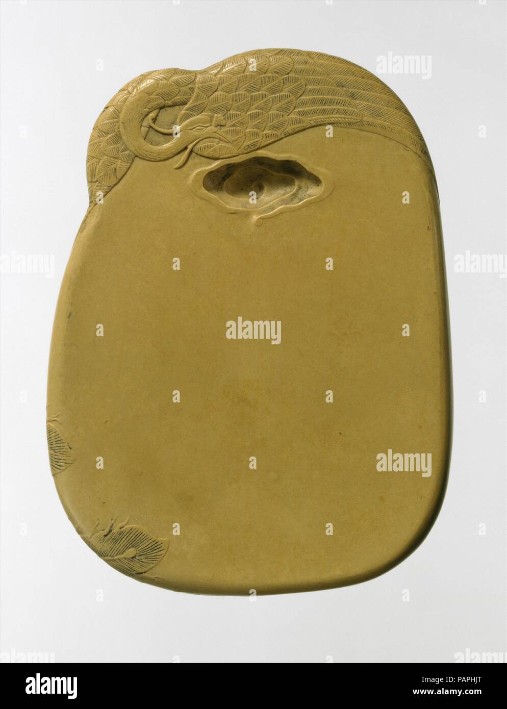 Inkstone with phoenix design. Artist: Attributed to Gu Erniang (Chinese, active early 18th century). Culture: China. Dimensions: L. 5 1/16 in. (12.9 cm); W. 3 3/4 in. (9.5 cm). Date: 18th century. Museum: Metropolitan Museum of Art, New York, USA. Stock Photo