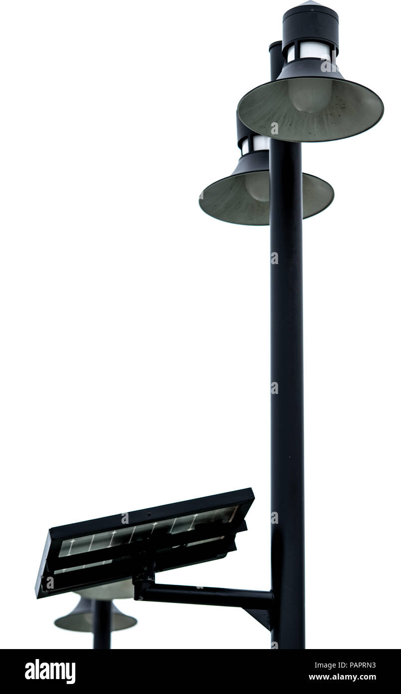 Street lamppost with solar cell panel power. Electric pole with solar energy. Green energy concept. Renewal energy in modern city. Alternative electri Stock Photo
