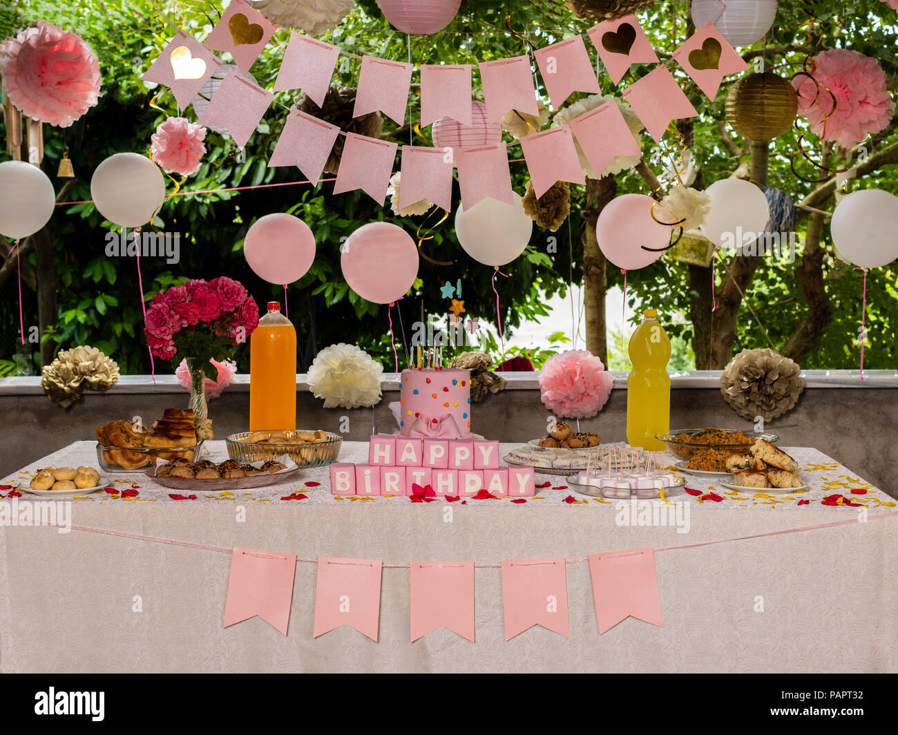 Birthday cake and Happy Birthday ornaments, Turkish type birthday table Stock Photo