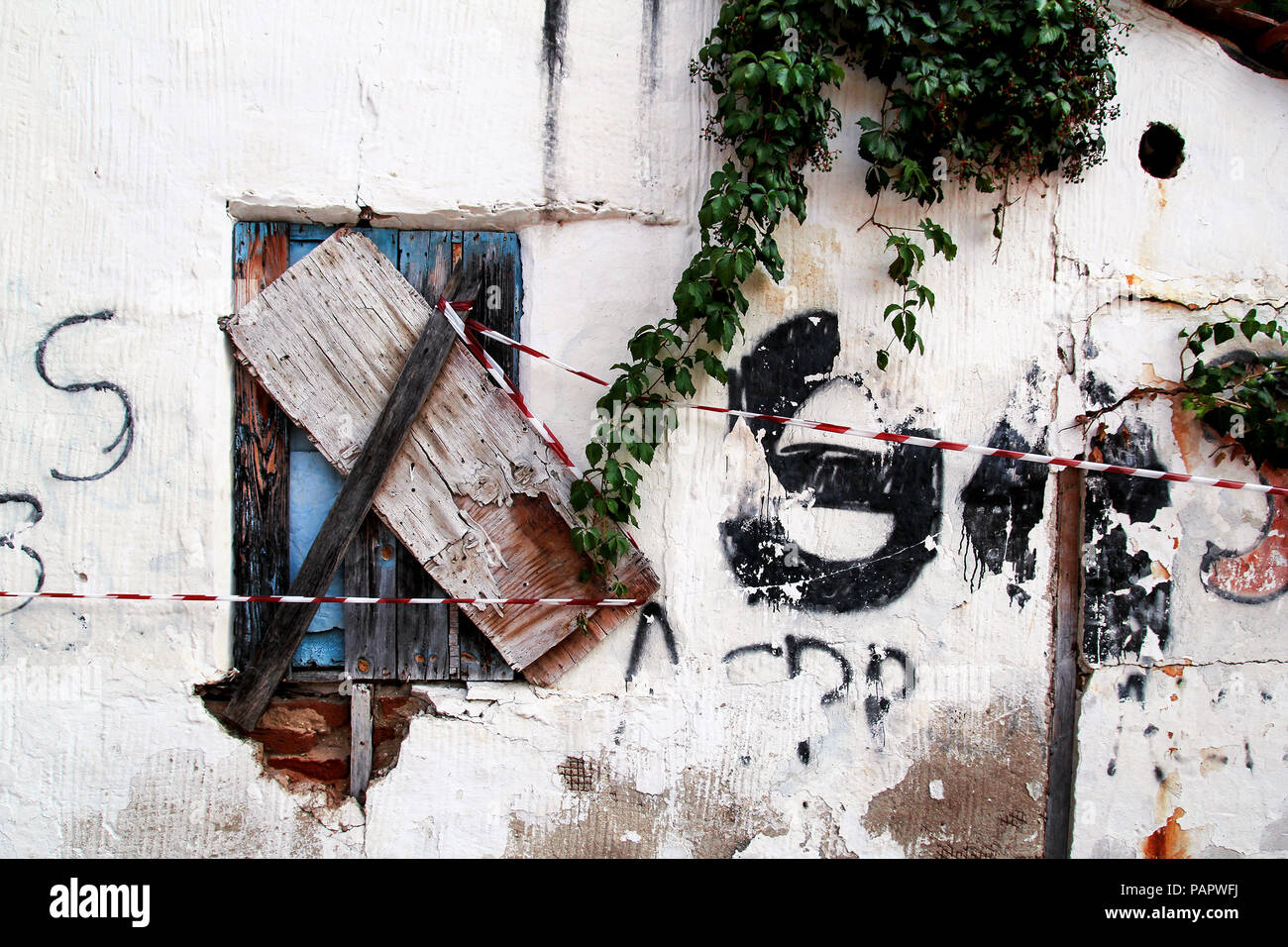 Rustic Graffiti The old rustic house wall with wooden window and graffiti Stock Photo ...
