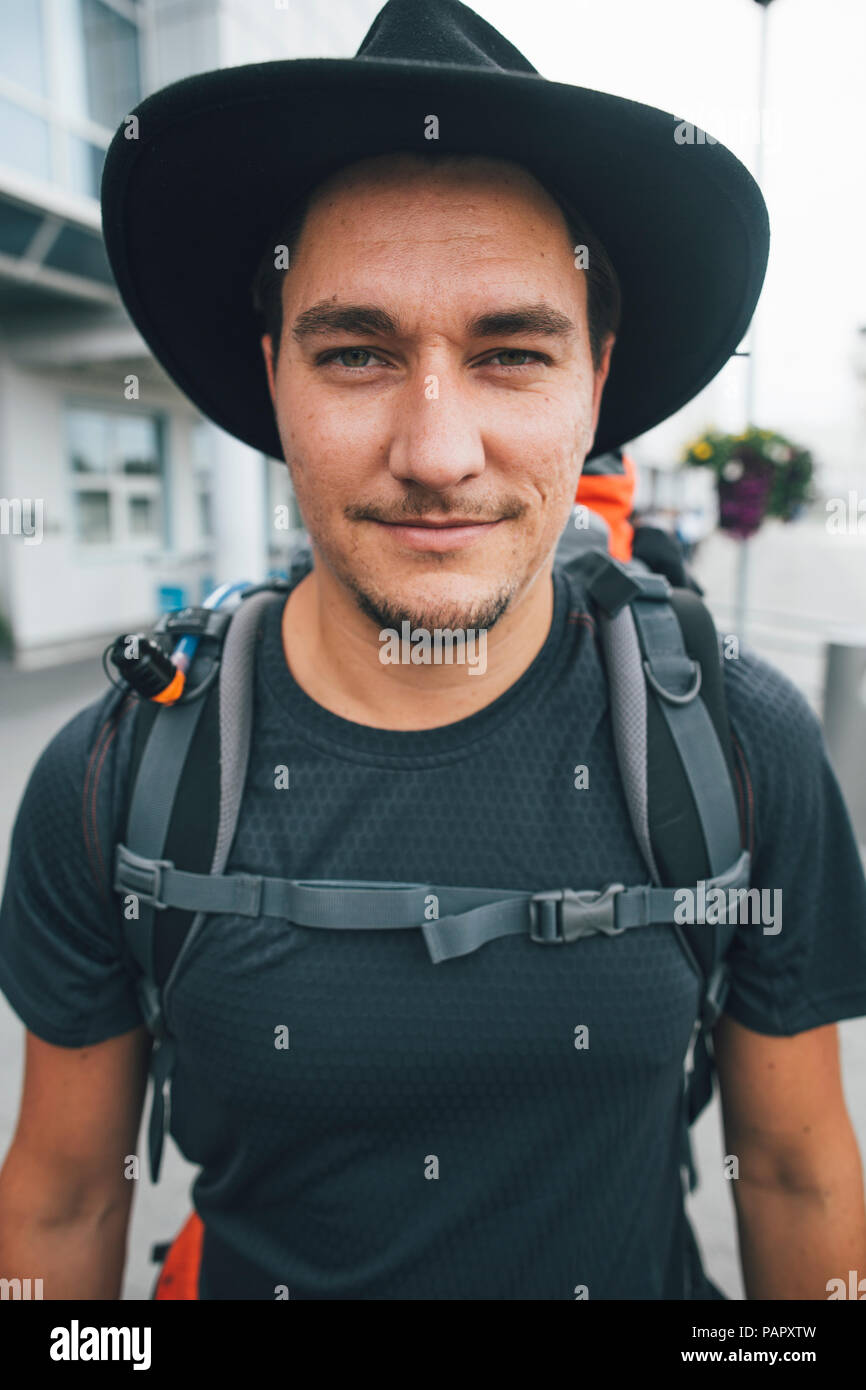 Portrait of backpacker with hat, travelling the Lofoten Stock Photo - Alamy