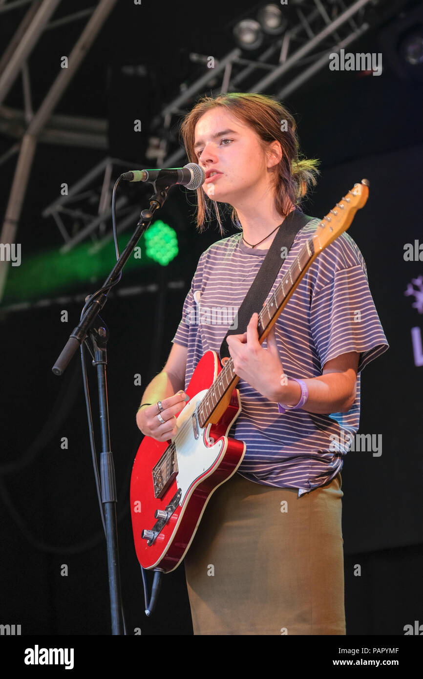 Clottie Cream, lead singer of Goat Girl performing at the Larmer Tree Festival,  Tollard Royal, Wiltshire, UK. July 22, 2018 Stock Photo