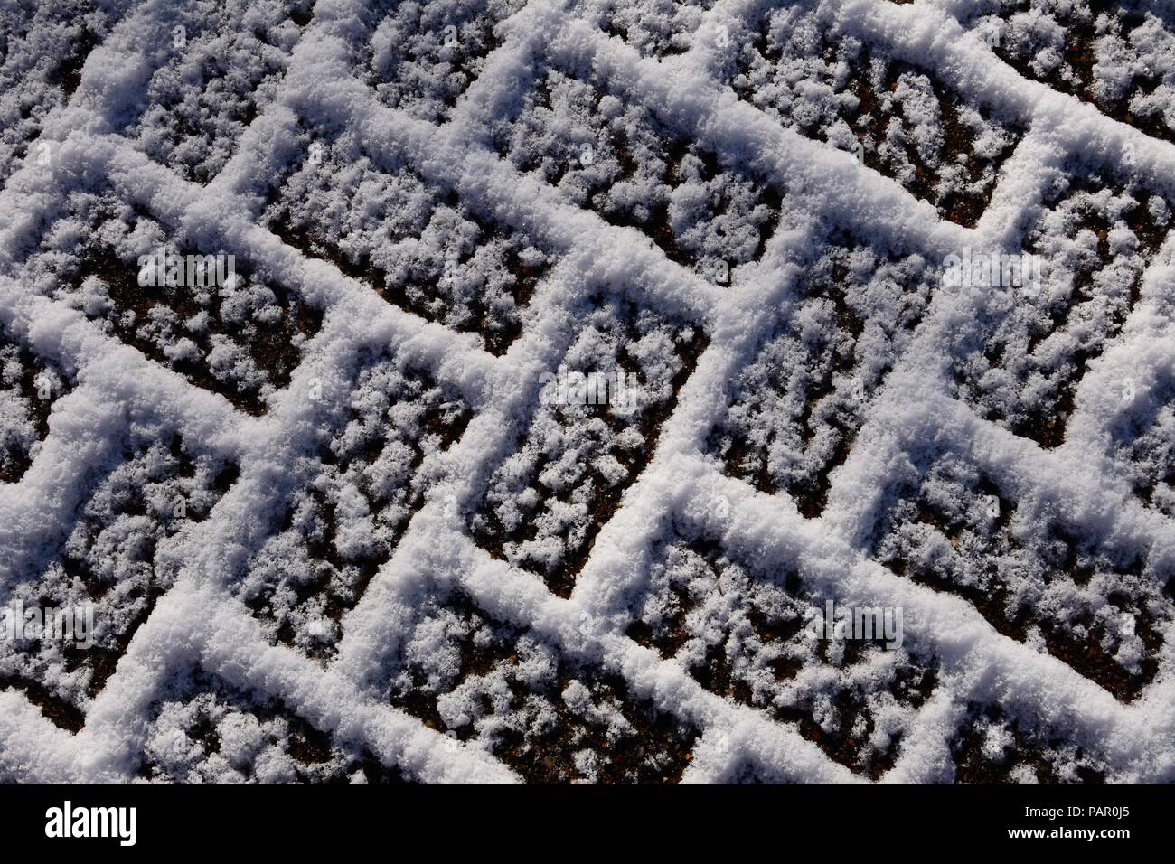 Snow covered block paving bricks, England, UK, Western Europe. Stock Photo