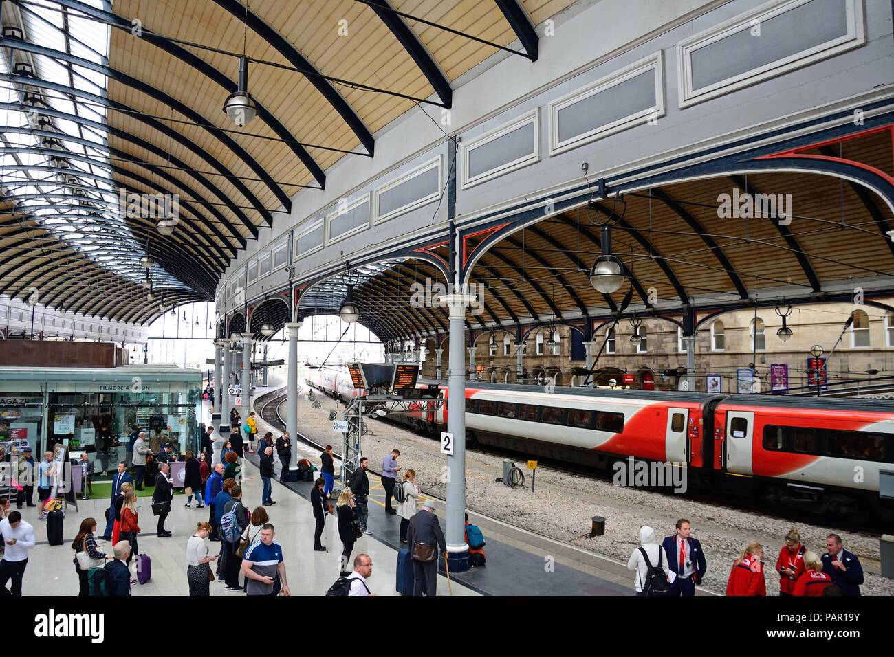 Passengers waiting on the railway platform in the Newcastle central