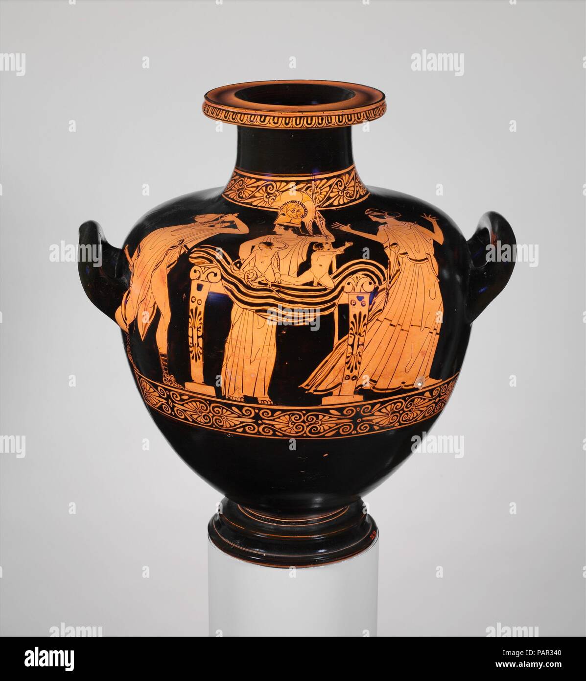 Terracotta hydria: kalpis (water jar). Culture: Greek, Attic. Dimensions: H. 14 1/2 in. (36.8 cm)  diameter without handles  11 5/16 in. (28.7 cm). Date: ca. 460-450 B.C..  The infant Herakles strangling snakes sent by the goddess Hera  Herakles, the greatest of the Greek heroes, was one of twins conceived in a night when Alkmene, the wife of Amphitryon, was visited by both her husband and the god Zeus.  Angered by his infidelity, Zeus's wife, Hera, tried to kill the infant Herakles with snakes.  Here the child strangles them in the presence of his parents and Athena, his protective goddess. M Stock Photo