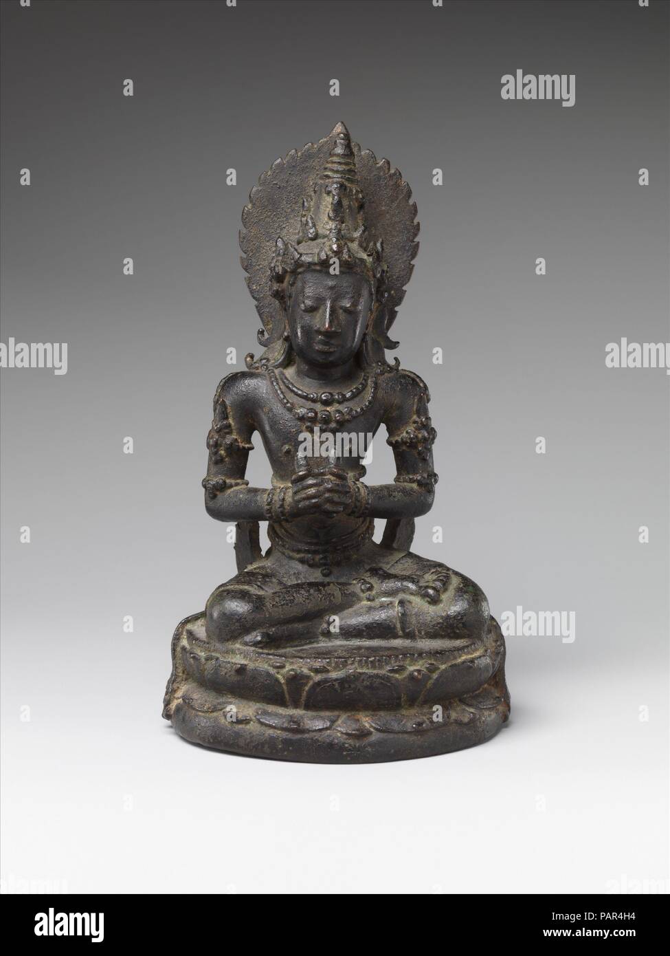 Seated Esoteric Buddhist Deity. Culture: Indonesia (Java). Dimensions: H. 6 3/5 in. (16.8 cm). Date: ca. second half of the 11th-century. Museum: Metropolitan Museum of Art, New York, USA. Stock Photo