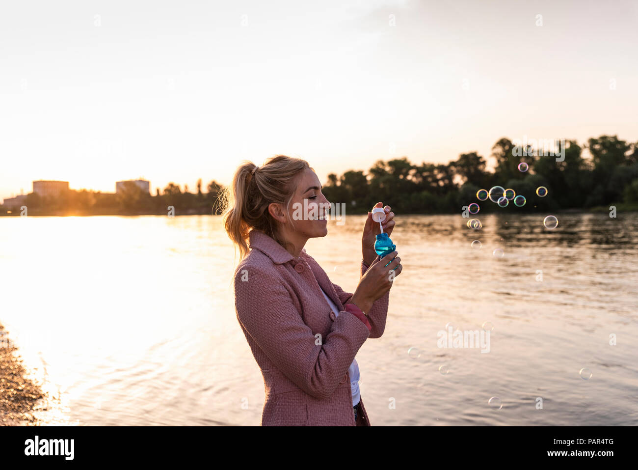 Blond woman and soap bubble Stock Photo