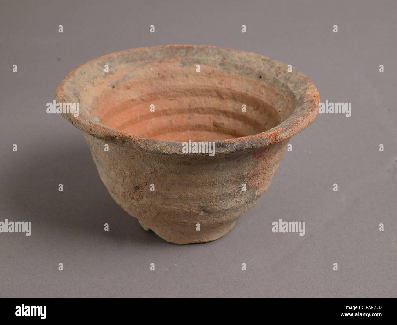 Bowl. Culture: Coptic. Dimensions: Overall: 2 x 3 7/16 in. (5.1 x 8.7 cm). Date: 4th-7th century. Museum: Metropolitan Museum of Art, New York, USA. Stock Photo