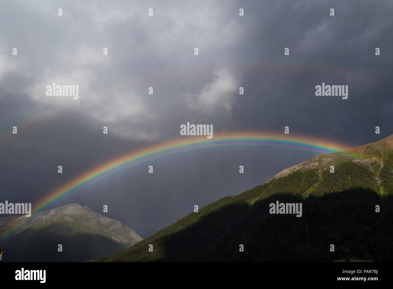 Switzerland, Grisons, Engadin, S-Chanf, rainbow Stock Photo