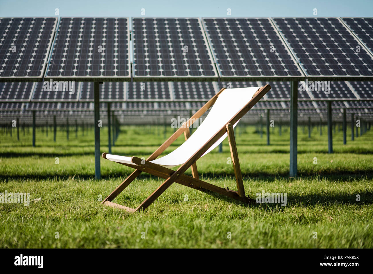 Germany, Kevelaer, solar plant and beach lounger Stock Photo