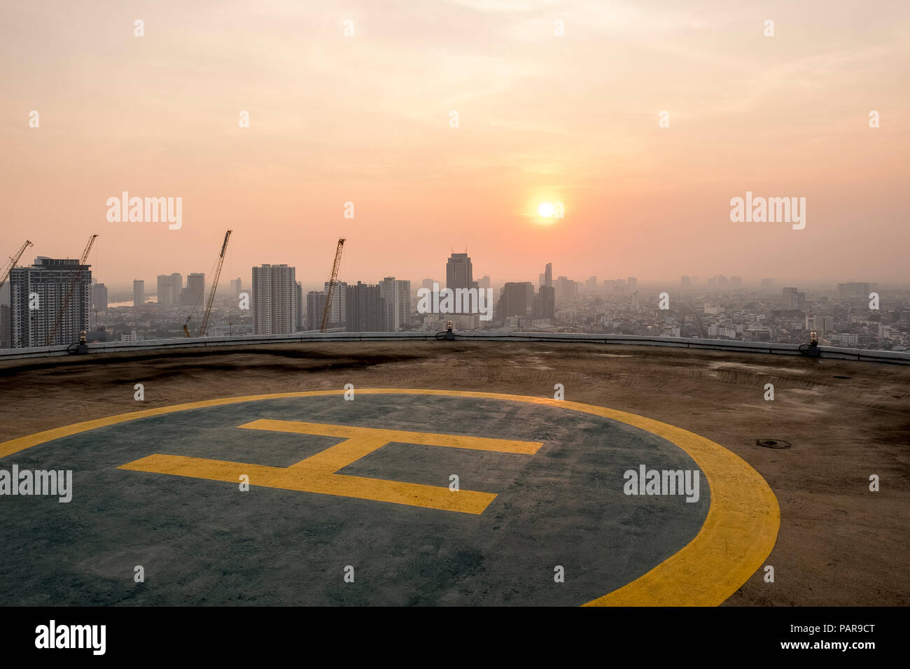 Thailand, Bangkok, helipad on roof top at sunrise Stock Photo