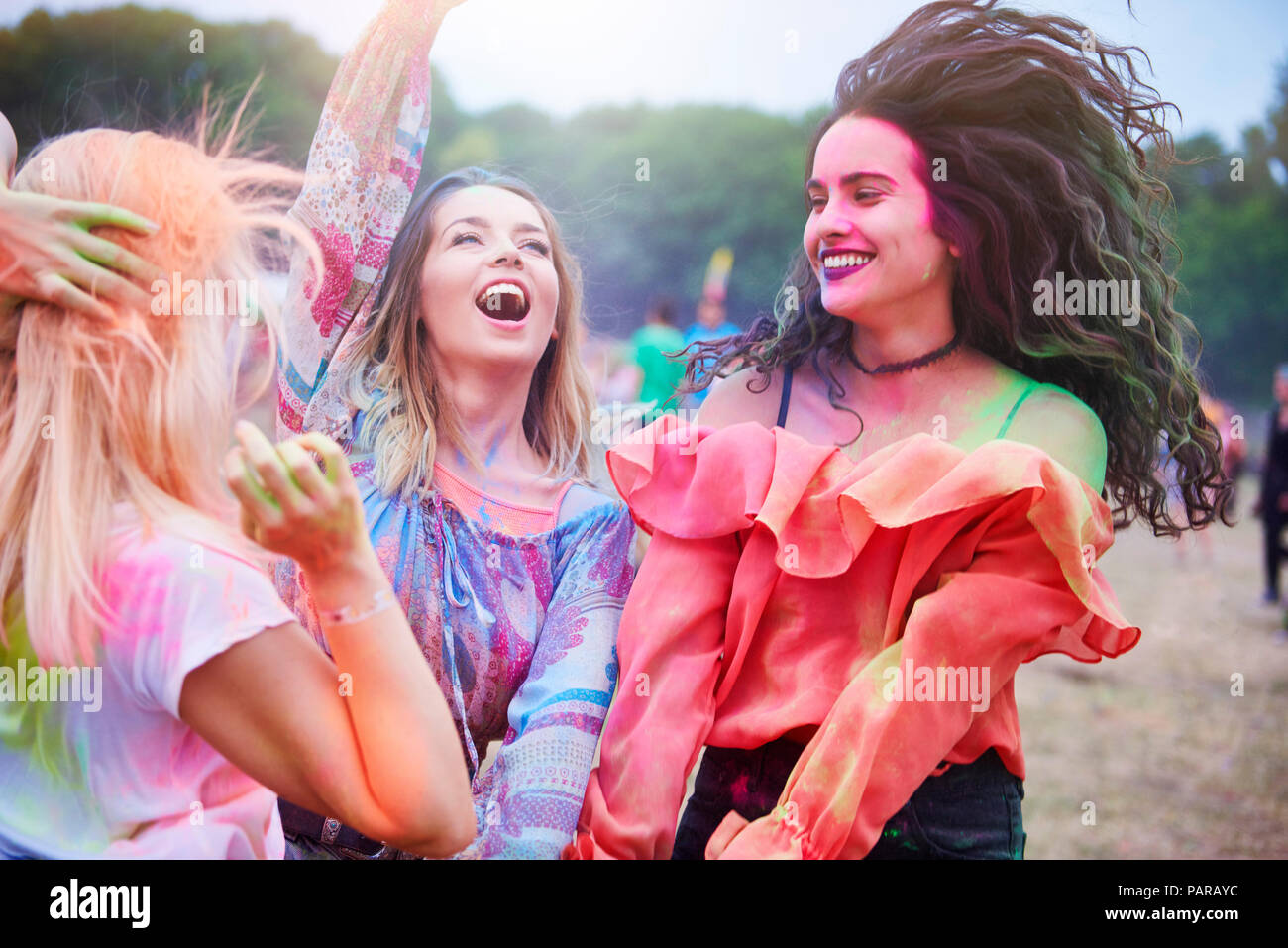 Happy women dancing at the music festival Stock Photo