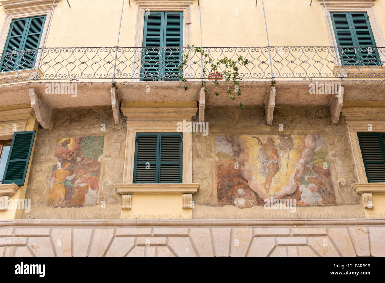 Fresco on Wall, balcony, balconies, verandah, typical street, Verona, Italy Stock Photo