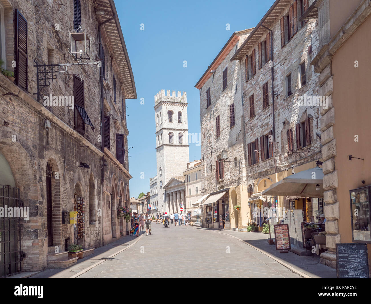 Medieval shops and buildings in the town center of Assisi, Italy, with