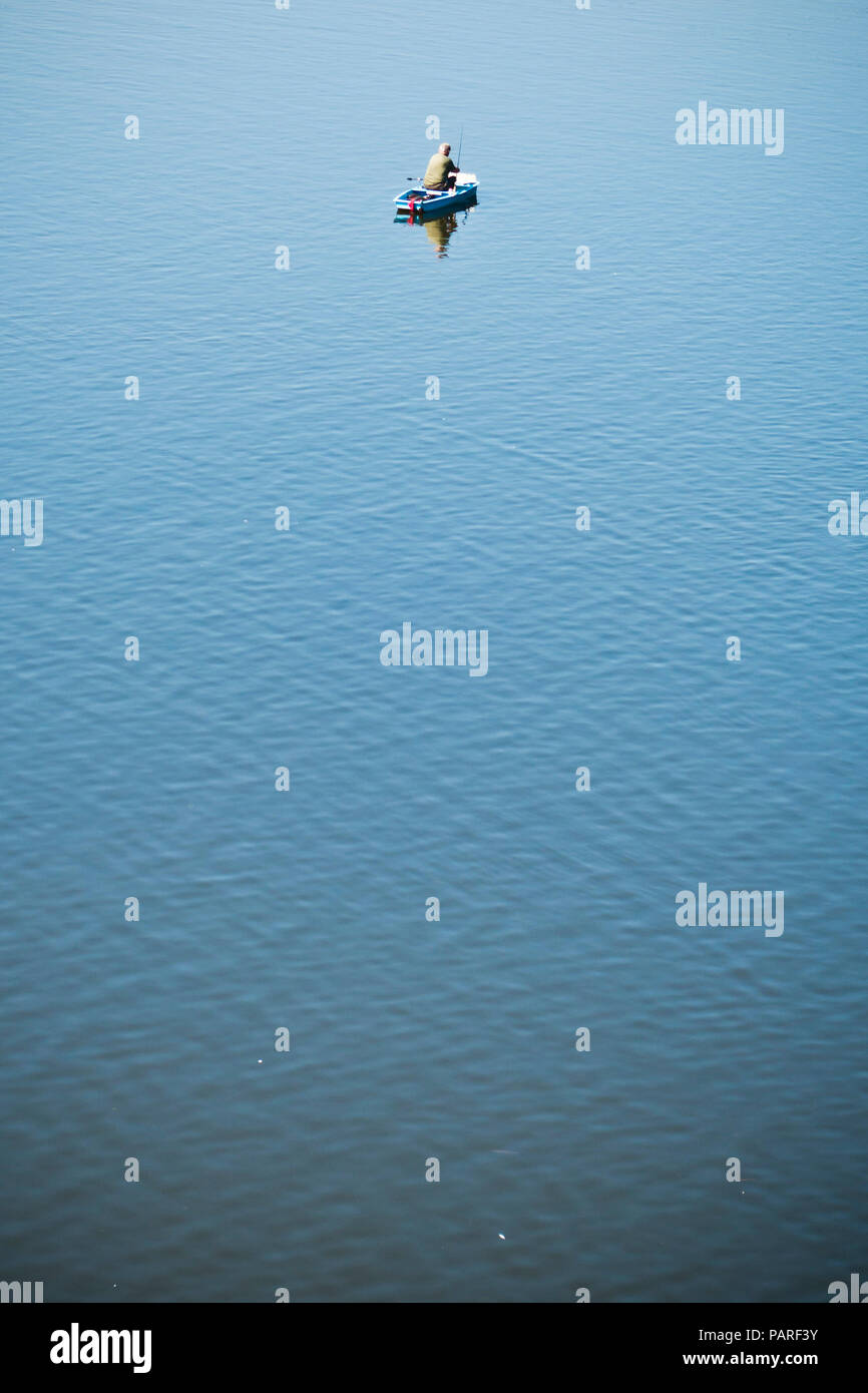 Fisherman fishing on a boat hi-res stock photography and images - Alamy