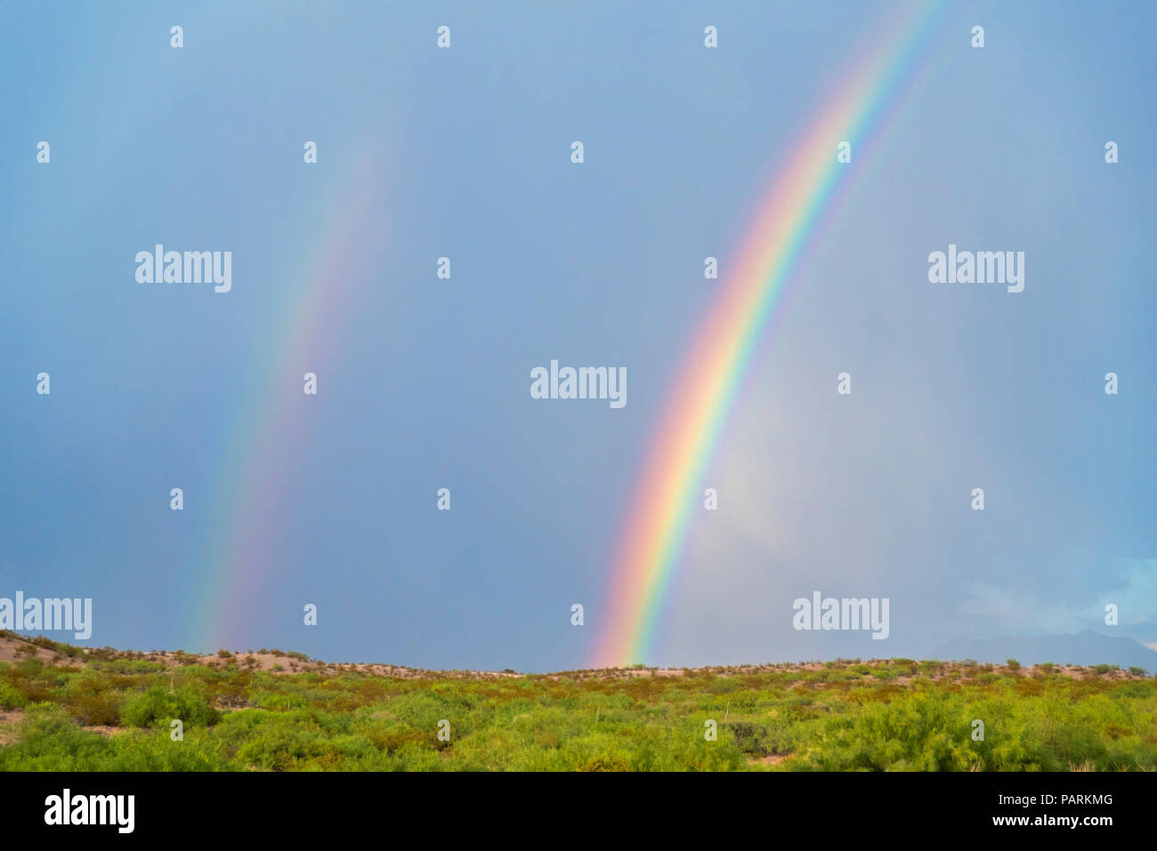 double rainbow during a storm Stock Photo - Alamy