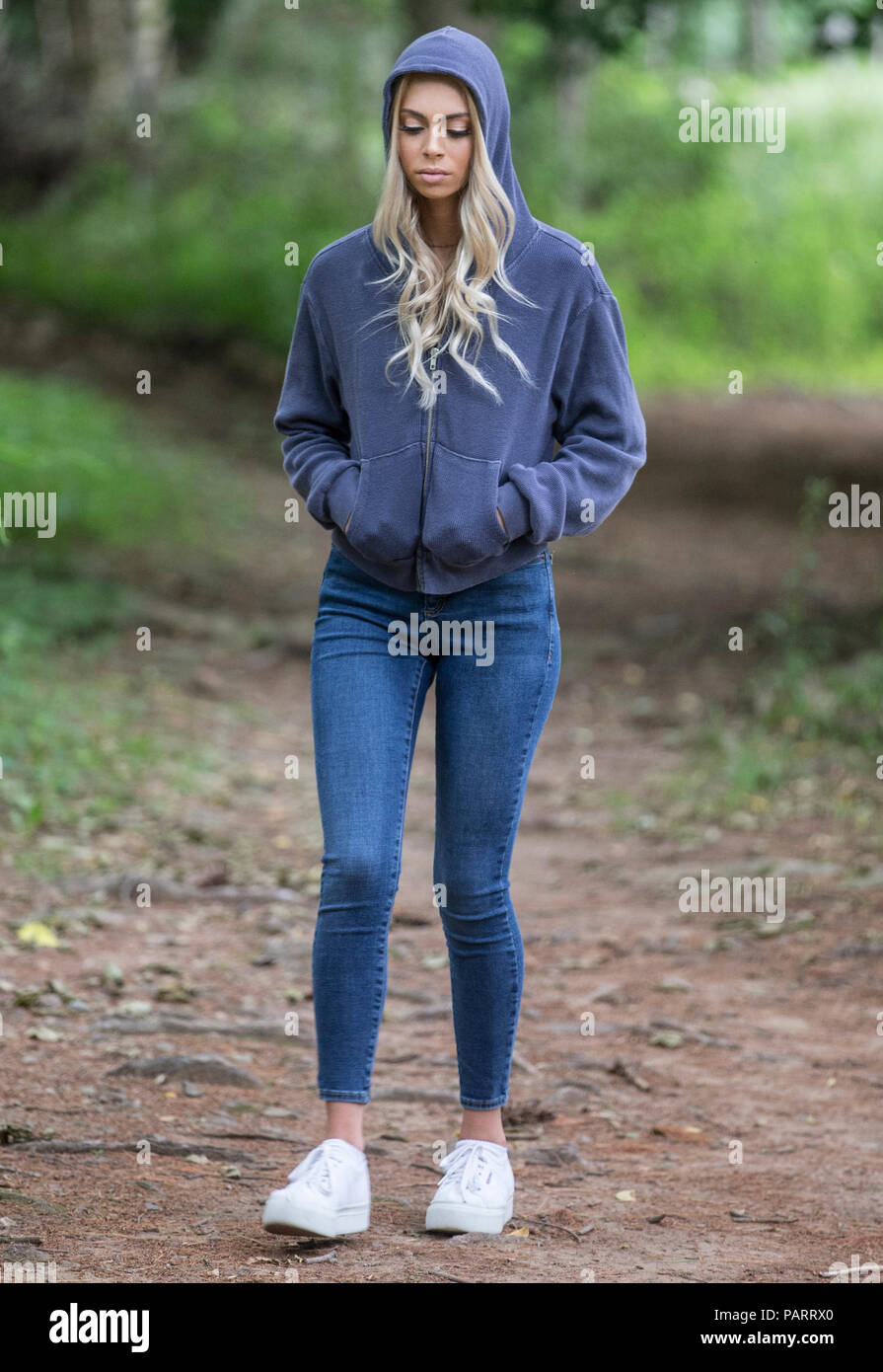 Teenage girl in a somber mood Stock Photo - Alamy