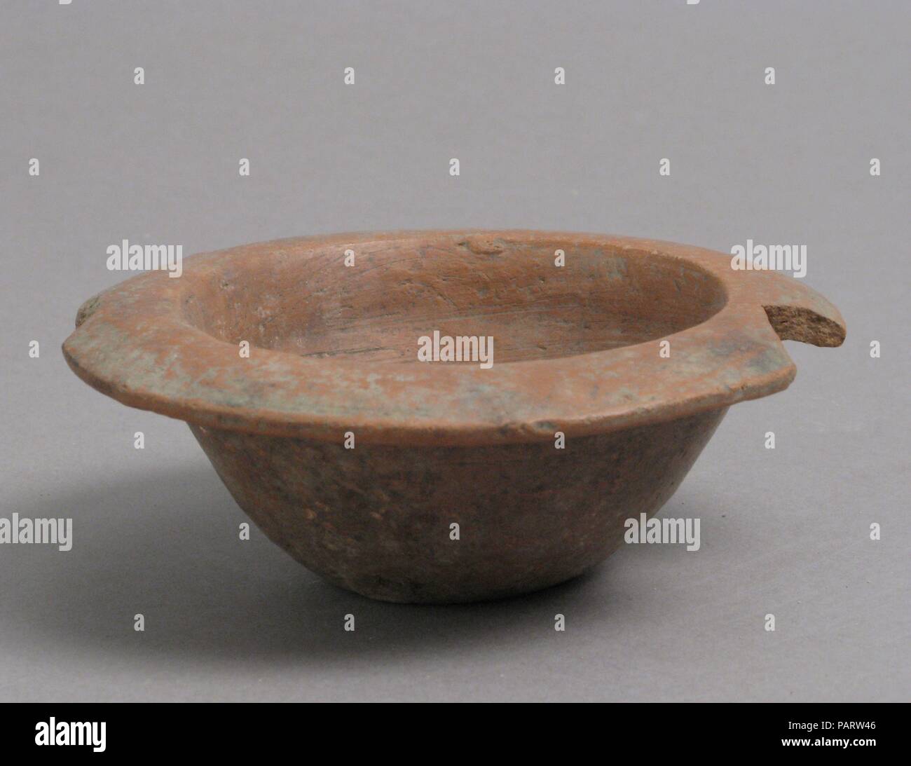 Bowl. Culture: Coptic. Dimensions: Overall: 1 7/16 x 3 7/8 in. (3.6 x 9.9 cm). Date: 4th-7th century. Museum: Metropolitan Museum of Art, New York, USA. Stock Photo