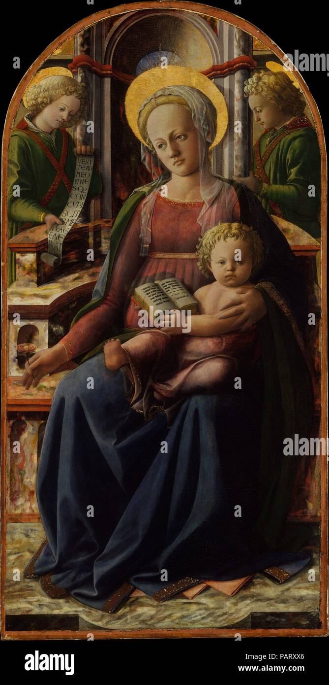 Madonna and Child Enthroned with Two Angels. Artist: Fra Filippo Lippi (Italian, Florence ca. 1406-1469 Spoleto). Dimensions: Arched top, 48 1/4 x 24 3/4 in. (122.6 x 62.9 cm). Date: ca. 1440.  The Virgin holds a rose as the Bride of Christ and is seated on the Throne of Wisdom. The scroll held by an angel reads: 'Come over to me, all ye that desire me, and be filled with my fruits.' (Ecclesiasticus 24:19) The picture is the center of an important triptych. Lippi was the most innovative painter in Italy and closely attentive to Netherlandish painting: notable here is his varied study of light  Stock Photo