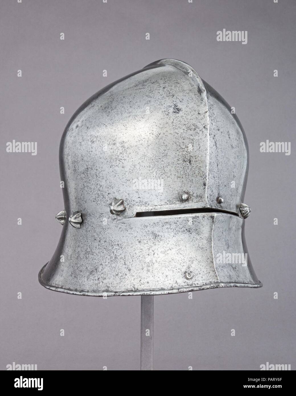 Sallet. Armorer: Attributed to Adrian Treytz the Elder (Austrian, Innsbruck, active ca. 1473-92). Culture: Austrian, Innsbruck. Dimensions: H. 9 3/4 in. (24.8 cm); W. 11 1/2 in. (29.2 cm); D. 14 5/8 in. (37.1 cm); Wt. 6 lb. 2 oz. (2778 g). Date: ca. 1480.  The maker's mark on this helmet, a horseshoe and a crescent, is attributed to Adrian Treytz the Elder, whose family included at least five armorers who worked for the Habsburg court in the late fifteenth and early sixteenth centuries. Museum: Metropolitan Museum of Art, New York, USA. Stock Photo