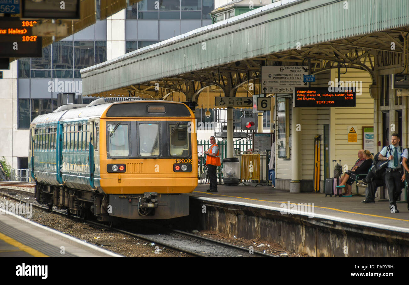 Diesel commuter train alongside a platform at Cardiff Central Station Stock Photo Alamy