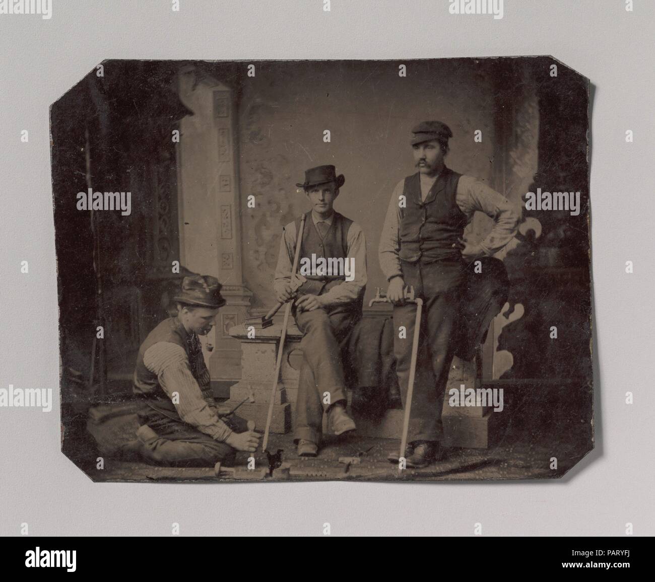 [Three Plumbers with Pipes and Tools]. Artist: Unknown (American ...