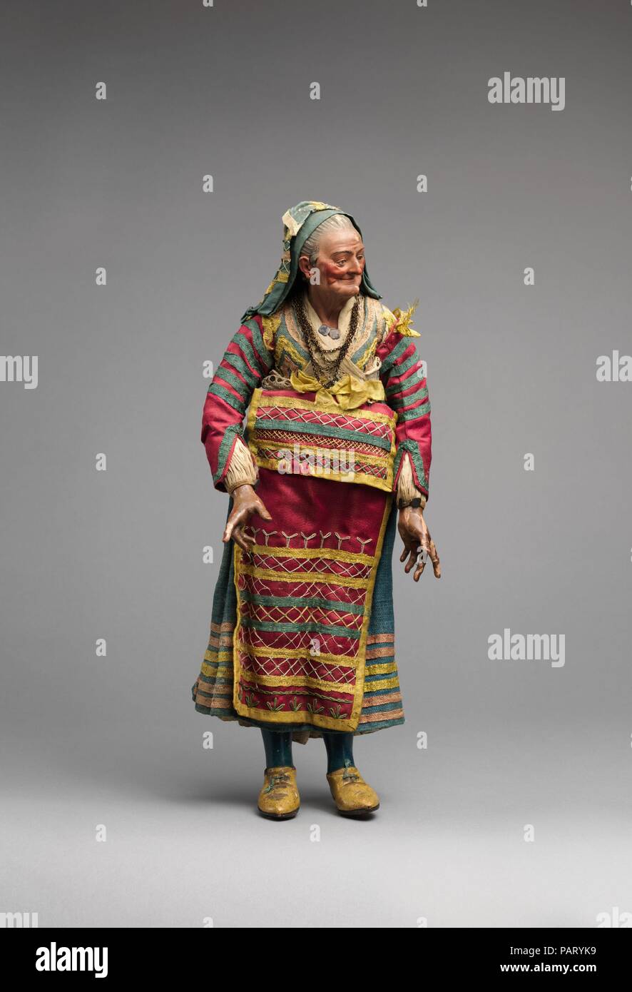 traditional italian christmas dress Old woman in blue dress and red apron. Culture: Italian. Dimensions:  Overall (confirmed): 14 1/2 × 5 1/4 × 3 1/2 in. (36.8 × 13.3 × 8.9 cm).  Date: second half 18th-mid-19th