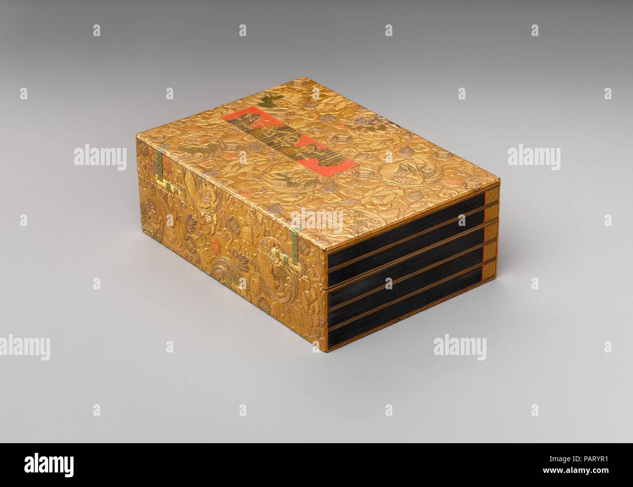 Box with Title Genji monogatari (The Tale of Genji). Culture: Japan. Dimensions: H. 1 1/2 in. (3.8 cm); L. 4 3/8 in. (11.1 cm). Date: 19th century. Museum: Metropolitan Museum of Art, New York, USA. Stock Photo