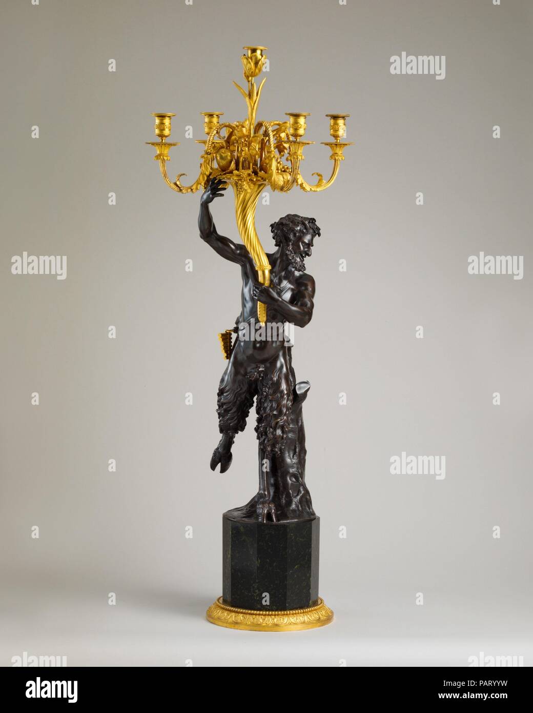 Five-light candelabrum (one of a pair). Culture: French. Dimensions: H. 45 3/8 x W. 13 1/2 x D. 17 1/2in. (115.3 x 34.3 x 44.5cm). Modeler: Derived from a model by Clodion (Claude Michel) (French, Nancy 1738-1814 Paris). Date: ca. 1785. Museum: Metropolitan Museum of Art, New York, USA. Stock Photo