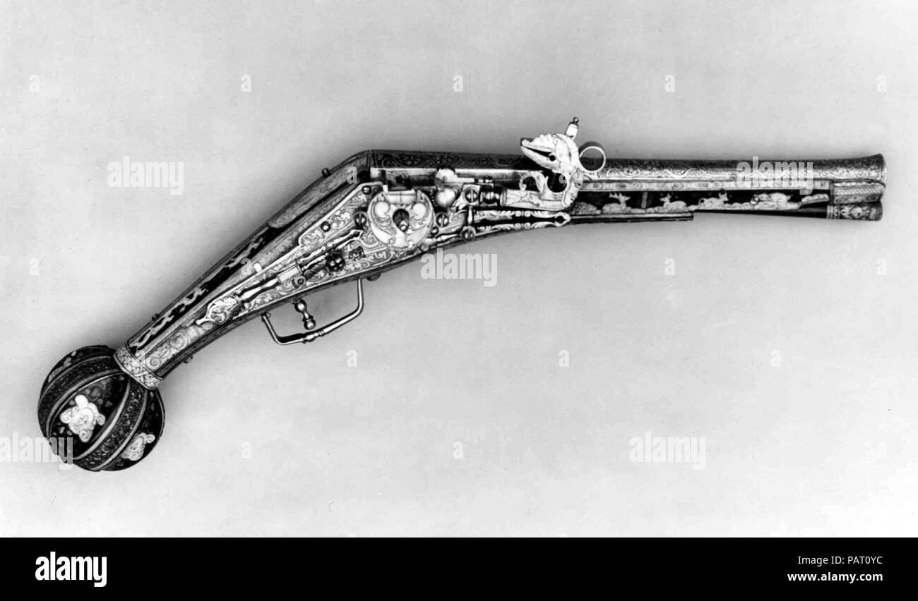 Wheellock Pistol. Culture: German, Nuremberg. Dimensions: L. 19 3/4 in. (50.2 cm); L. of barrel 12 in. (30.5 cm); Cal. .528 in. (13.4 mm); L. of lock 7 5/8 in. (19.4 cm); L. of plug 7 3/8 in. (18.7 cm); Wt. 3 lb. 14 oz. (1758 g). Gunsmith: Peter Danner (German, Nuremberg, ca. 1580-1602). Date: ca. 1580.  This is a classic example of a finely made and well decorated wheellock pistol from Nuremberg made in the late sixteenth century. Museum: Metropolitan Museum of Art, New York, USA. Stock Photo